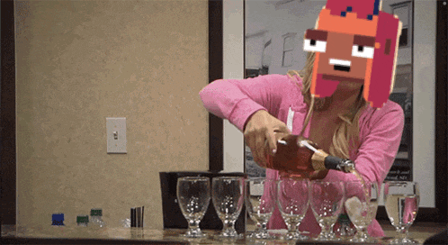a woman in a pink shirt is pouring a drink into glasses