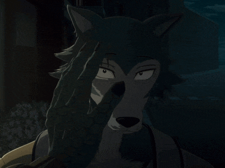 a close up of a cartoon character 's face with a dark background