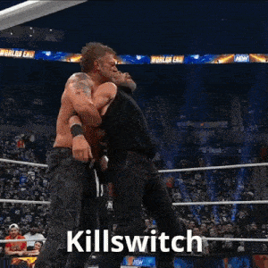 a man is wrestling another man in a wrestling ring and the word killswitch is on the bottom of the picture .