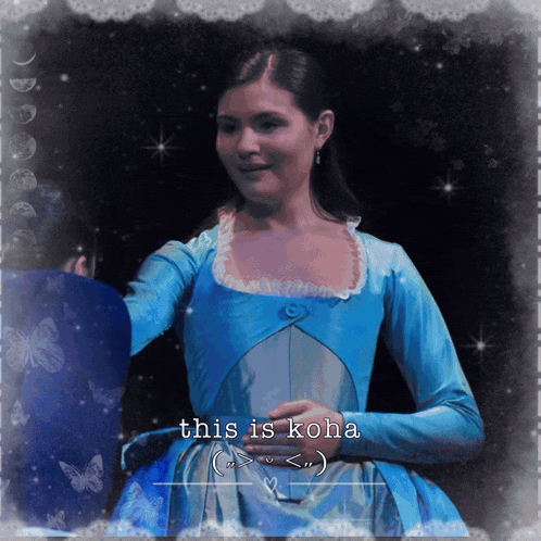 a picture of a woman in a blue dress with the words this is koha