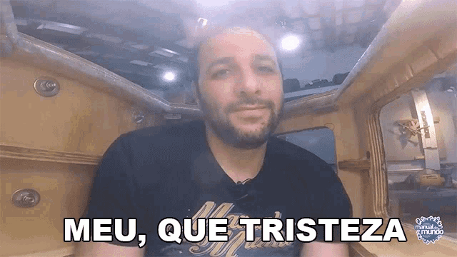a man with a beard says meu que tristeza in a video