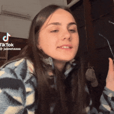 a woman 's face is shown with a tiktok watermark