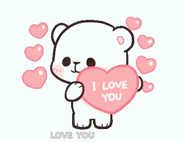 a white teddy bear is holding a pink heart that says `` i love you '' .