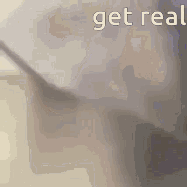 a close up of a person 's face with the words `` get real '' written on the bottom .