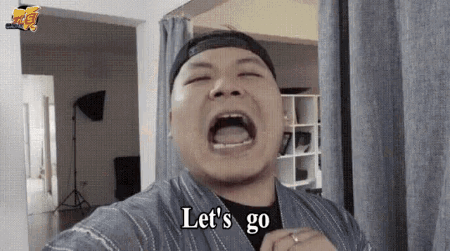 a man with his mouth open and the words let 's go written below him