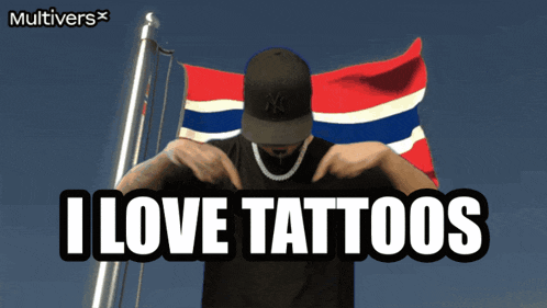 a man standing in front of a flag with the words " i love tattoos " above him