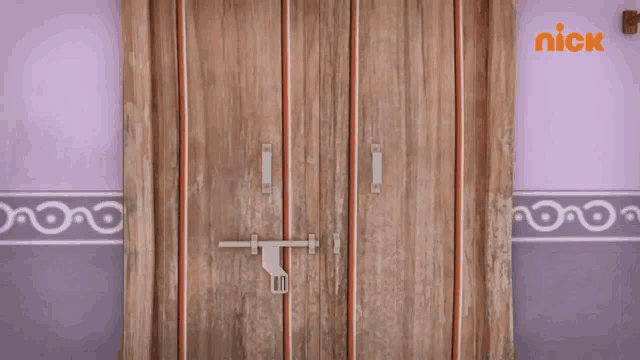 a cartoon character with a mustache is standing in a doorway .