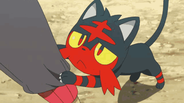 a cartoon cat with a red star on its head and yellow eyes