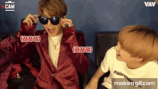 two boys wearing sunglasses and a shirt that says this is never