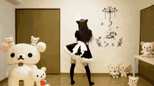a woman in a maid costume is dancing in a room with stuffed animals