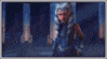 a blurred image of a person holding a light saber