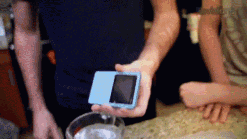 Need To Get Liquid Out Of Your Smartphone? Simply Submerge It With A Container Of Rice. GIF - Hacks Repair Smartphone GIFs