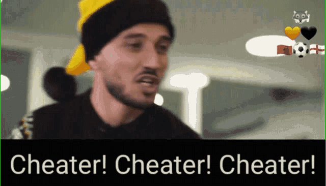 a man wearing a yellow hat says " cheater " on the bottom
