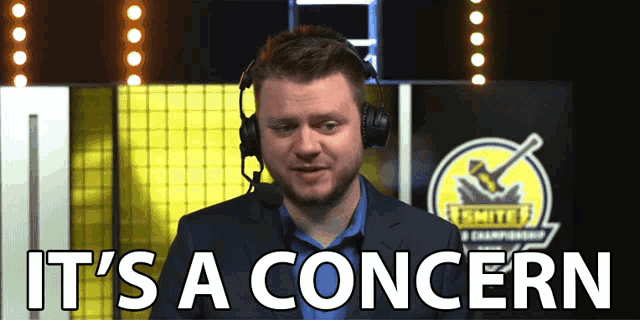 a man wearing headphones with the words it 's a concern below him