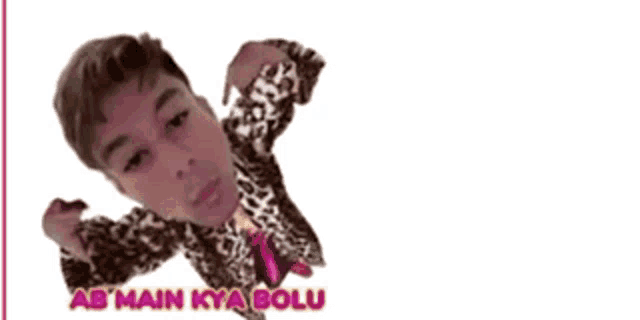 a man in a leopard print shirt with ab main kya bolu written on it