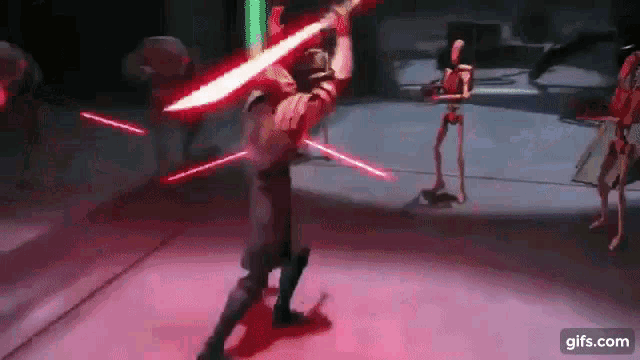 a man is holding a lightsaber in a dark room while fighting a robot .