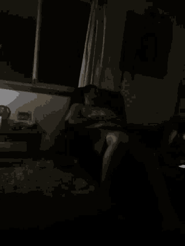 a blurry picture of a person in the dark