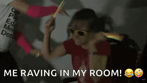 a girl wearing sunglasses and a shirt that says " me raving in my room "