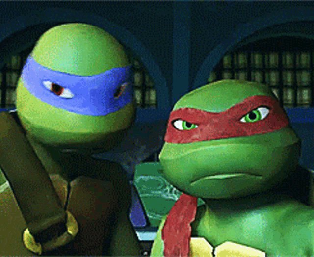 two teenage mutant ninja turtles are standing next to each other in a room