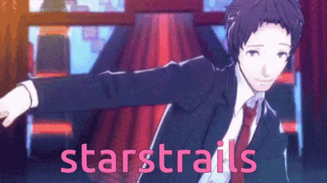 a man in a suit and tie is dancing in front of a sign that says " starstrails "