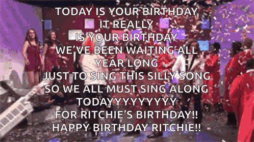 a group of people are singing a birthday song