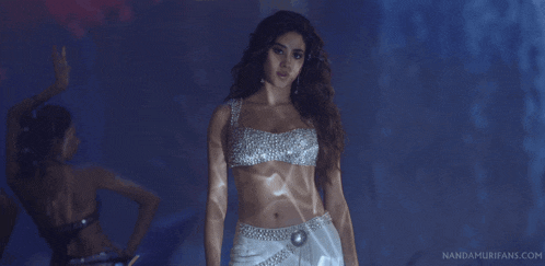 a picture of a woman dancing with the website nandamurifans.com in the corner