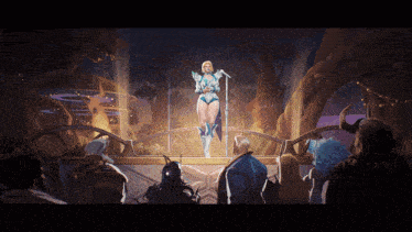 a woman is singing into a microphone in front of a crowd of people