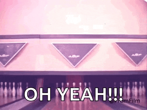 a bowling alley with the words `` oh yeah ! '' written on it .