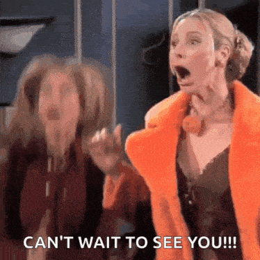 two women are standing next to each other with their mouths open and one of them is screaming .