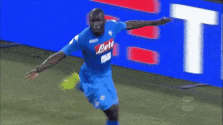 a soccer player in a blue jersey with the word lete on it