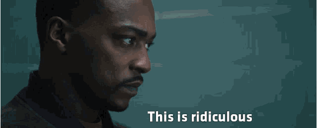 a man says " yeah i agree " in a dark room