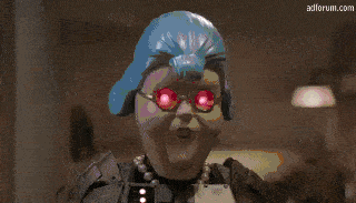 a pixelated image of a person with red lights coming out of their eyes with adforum.com in the bottom right corner