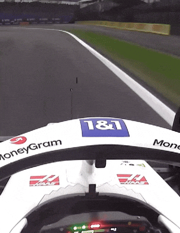 a white race car with the word moneygram on the side