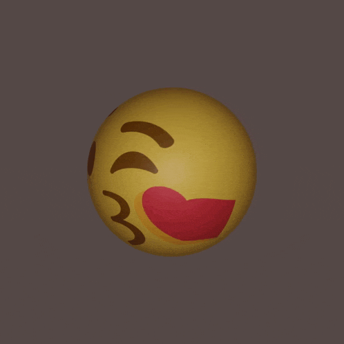 a yellow ball with a face on it on a grey background