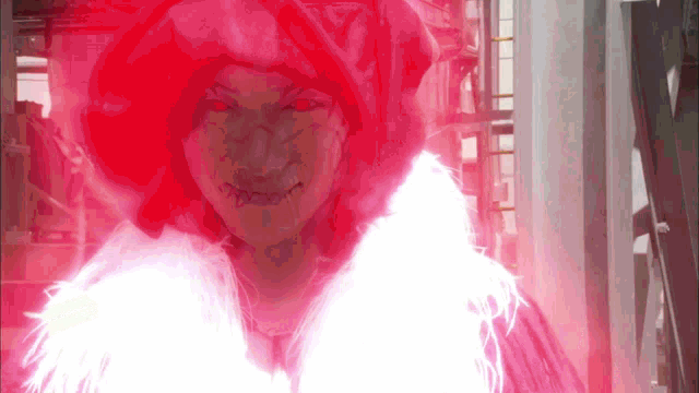 a woman in a white fur coat is surrounded by a red light