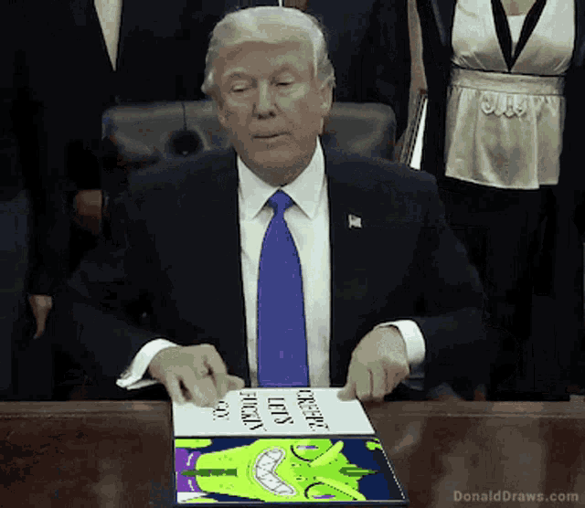 donald trump is sitting at a desk holding a book that says " creepy let 's fuck "