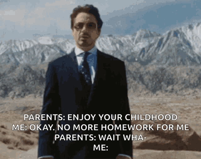 a man in a suit and tie stands in front of mountains and says parents enjoy your childhood me okay no more homework for me