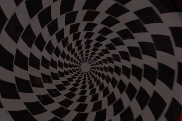 a black and white optical illusion with a red hand in the center
