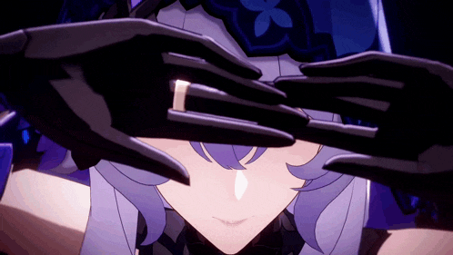 a close up of a person 's face with black gloves on