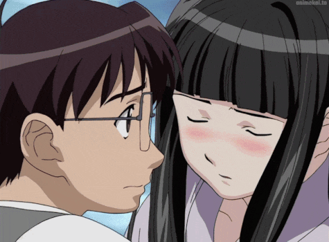 a man and a woman are looking at each other with animekol.to written on the bottom right