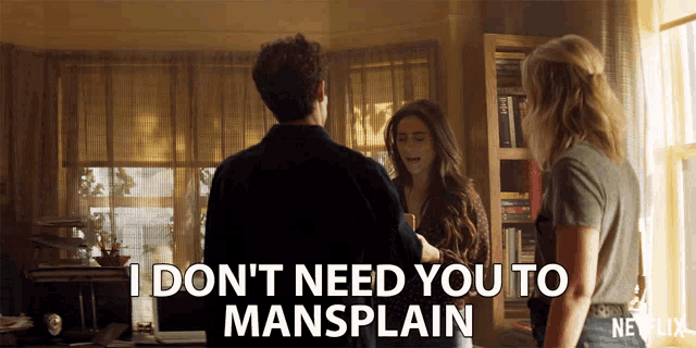 a man and two women are standing in a room with the words i don t need you to mansplain