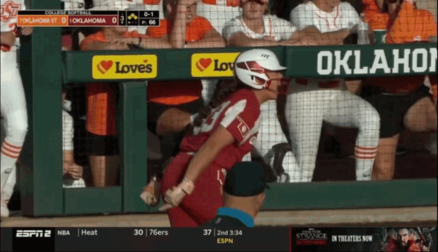 a baseball game is being played between oklahoma st and college softball