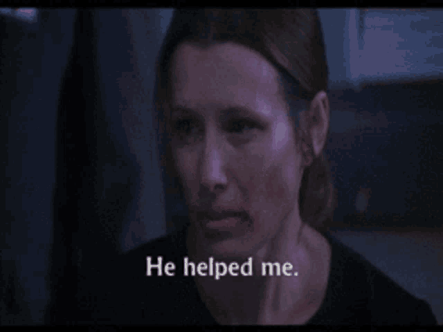 a woman in a dark room with the words he helped me on her face