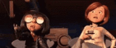 a couple of cartoon characters standing next to each other . one of the characters is wearing goggles .