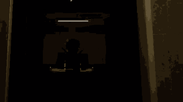 a pixelated image of a doorway with a light on