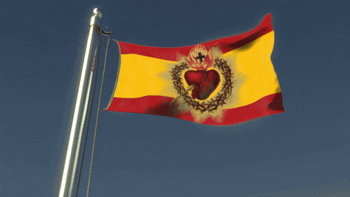 a red and yellow flag with a heart in the middle