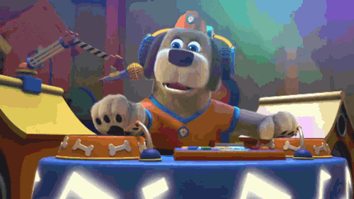 a cartoon dog wearing headphones and a hat is sitting at a table