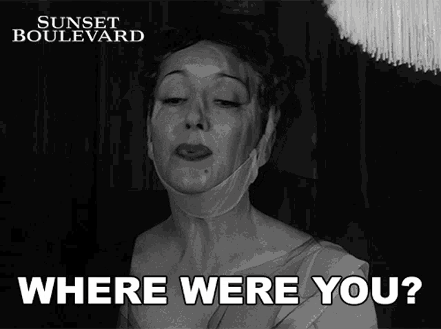 a poster for sunset boulevard shows a woman with a bandage on her neck