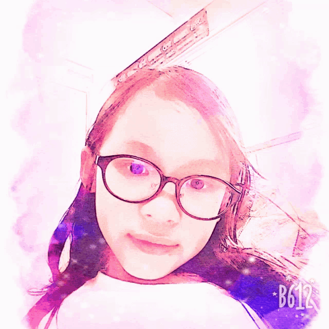 a girl wearing glasses is surrounded by flowers and has the number b612 on the bottom right