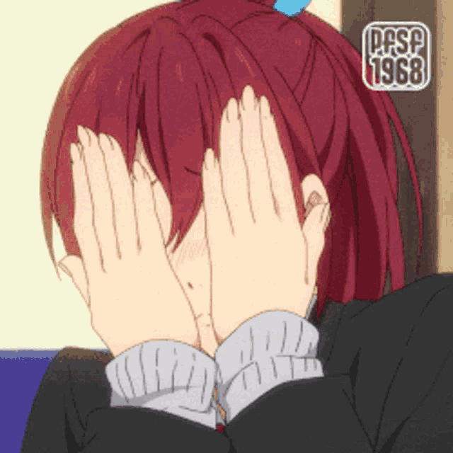 a girl with red hair is covering her face with her hands and the year 1968 is above her